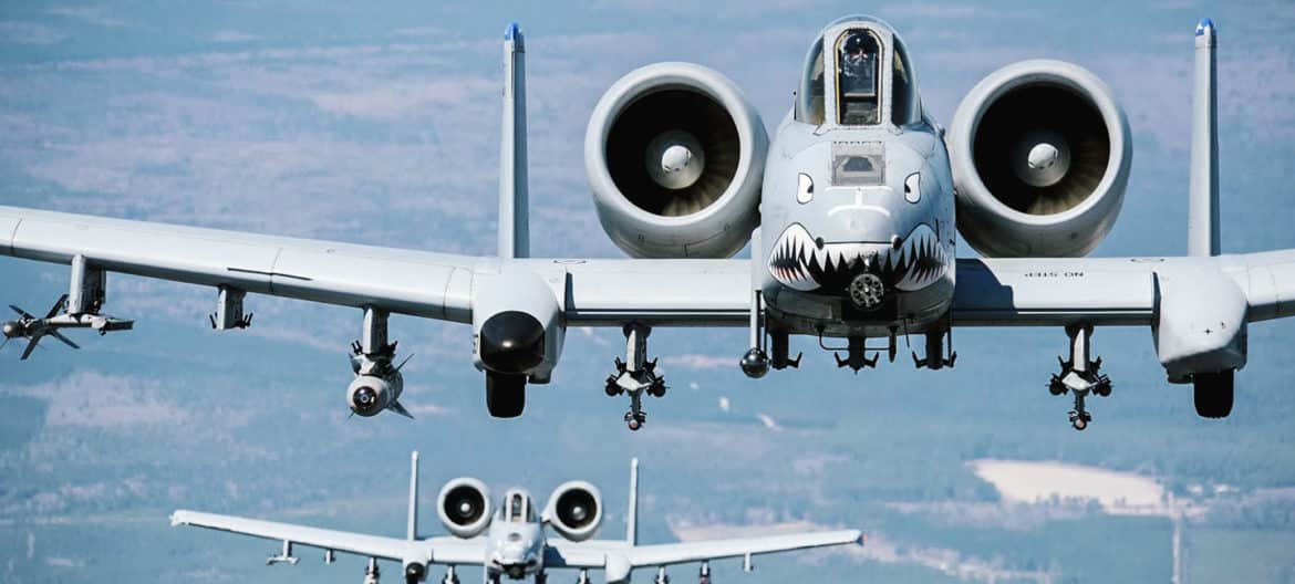 Two A-10C Thunderbolt II aircraft fly a flight training mission March 16, 2010, over Moody Air Force Base, Ga. The A-10C is the first Air Force aircraft specially designed for close-air support of ground forces. (U.S. Air Force photo/Airman 1st Class Benjamin Wiseman)