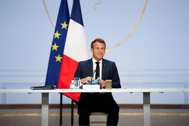 FILE PHOTO: French President Emmanuel Macron meets with trade unions and employers' representatives amid the coronavirus disease (COVID-19) outbreak, at the Elysee Palace in Paris, France, June 4, 2020. Yoan Valat/Pool via REUTERS/File Photo