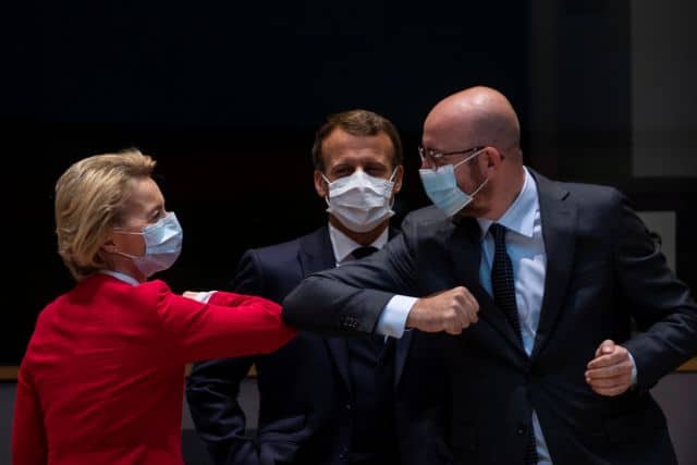 European Commission President Ursula von der Leyen greets European Council President Charles Michel with an elbow bump during a meeting on the sidelines of the first face-to-face EU summit since the coronavirus disease (COVID-19) outbreak, in Brussels, Belgium July 18, 2020. Francisco Seco/Pool via REUTERS