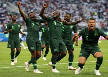 SAINT PETERSBURG, RUSSIA - JUNE 26:  Victor Moses of Nigeria celebrates with teammates after scoring his team's first goal  during the 2018 FIFA World Cup Russia group D match between Nigeria and Argentina at Saint Petersburg Stadium on June 26, 2018 in Saint Petersburg, Russia.  (Photo by Gabriel Rossi/Getty Images)