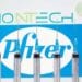 FILE PHOTO: Syringes are seen in front of displayed Biontech and Pfizer logos in this illustration taken November 10, 2020. REUTERS/Dado Ruvic/Illustration/File Photo