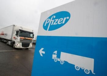 A refrigerated truck leaves the Pfizer plant in Puurs, Belgium December 3, 2020. REUTERS/Yves Herman