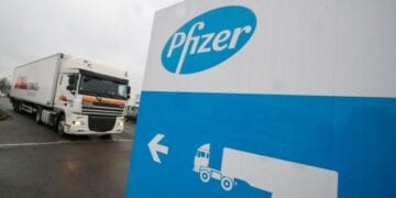 A refrigerated truck leaves the Pfizer plant in Puurs, Belgium December 3, 2020. REUTERS/Yves Herman