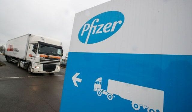 A refrigerated truck leaves the Pfizer plant in Puurs, Belgium December 3, 2020. REUTERS/Yves Herman