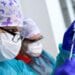 A healthcare worker fills a syringe with the Pfizer-BioNTech COVID-19 vaccine at the University Hospital, as the coronavirus disease (COVID-19) outbreak continues, in Nitra, Slovakia, December 26, 2020. REUTERS/Radovan Stoklasa