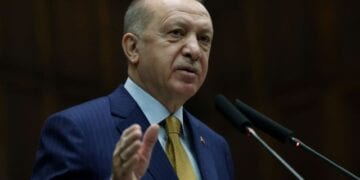 FILE PHOTO: Turkish President Tayyip Erdogan addresses members of his ruling AK Party during a meeting at the parliament?in Ankara, Turkey, December 23, 2020. Presidential Press Office/Handout via REUTERS ATTENTION EDITORS - THIS PICTURE WAS PROVIDED BY A THIRD PARTY. NO RESALES. NO ARCHIVE./File Photo