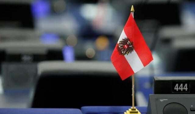 An Austrian flag is seen on the desk of a Member of the European Parliament during a debate at the European Parliament in Strasbourg, France, July 3, 2018. REUTERS/Vincent Kessler