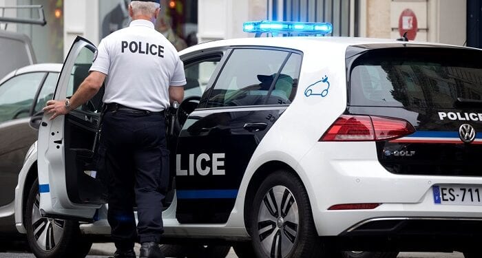 A policeman enters a new Volkswagen e-Golf electric vehicle for Paris police in Paris, France, June 19, 2018.  REUTERS/Charles Platiau