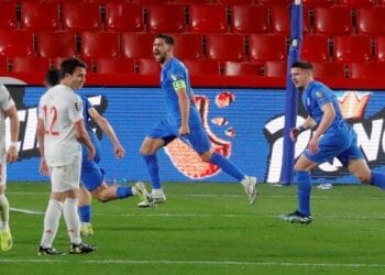 Soccer Football - World Cup Qualifiers Europe - Group B - Spain v Greece - Los Carmenes, Granada, Spain - March 25, 2021 Greece's Anastasios Bakasetas celebrates scoring their first goal with teammates REUTERS/Jon Nazca