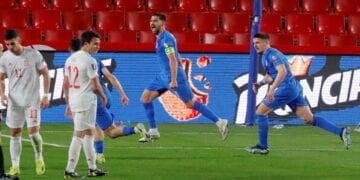 Soccer Football - World Cup Qualifiers Europe - Group B - Spain v Greece - Los Carmenes, Granada, Spain - March 25, 2021 Greece's Anastasios Bakasetas celebrates scoring their first goal with teammates REUTERS/Jon Nazca